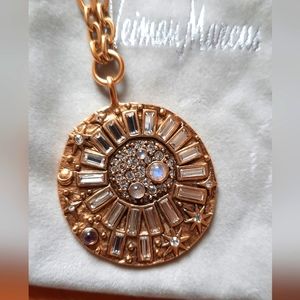 Celestial moonstone, amethyst, cubic zirconia gold colored medallion necklace